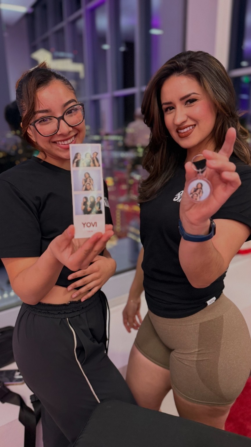 Guests showing their photo keychain and strip