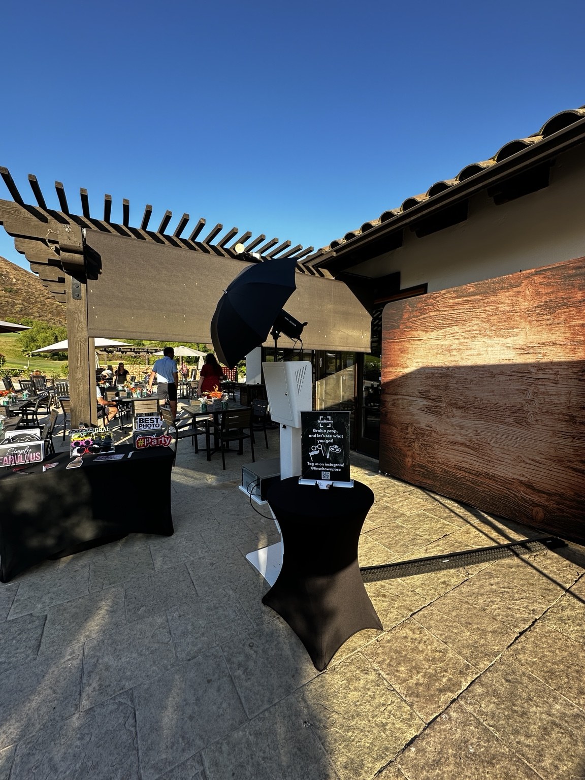 Lux Booth with backdrop and props outdoors