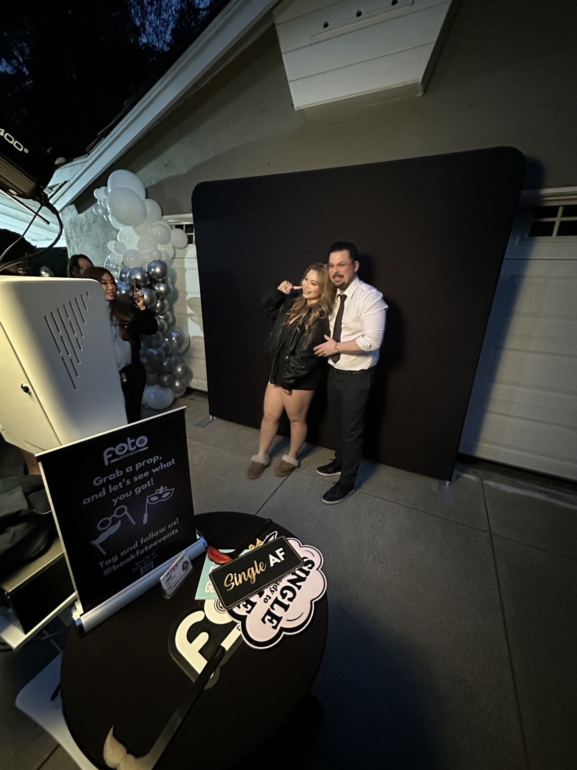 Guests posing at the Lux Booth